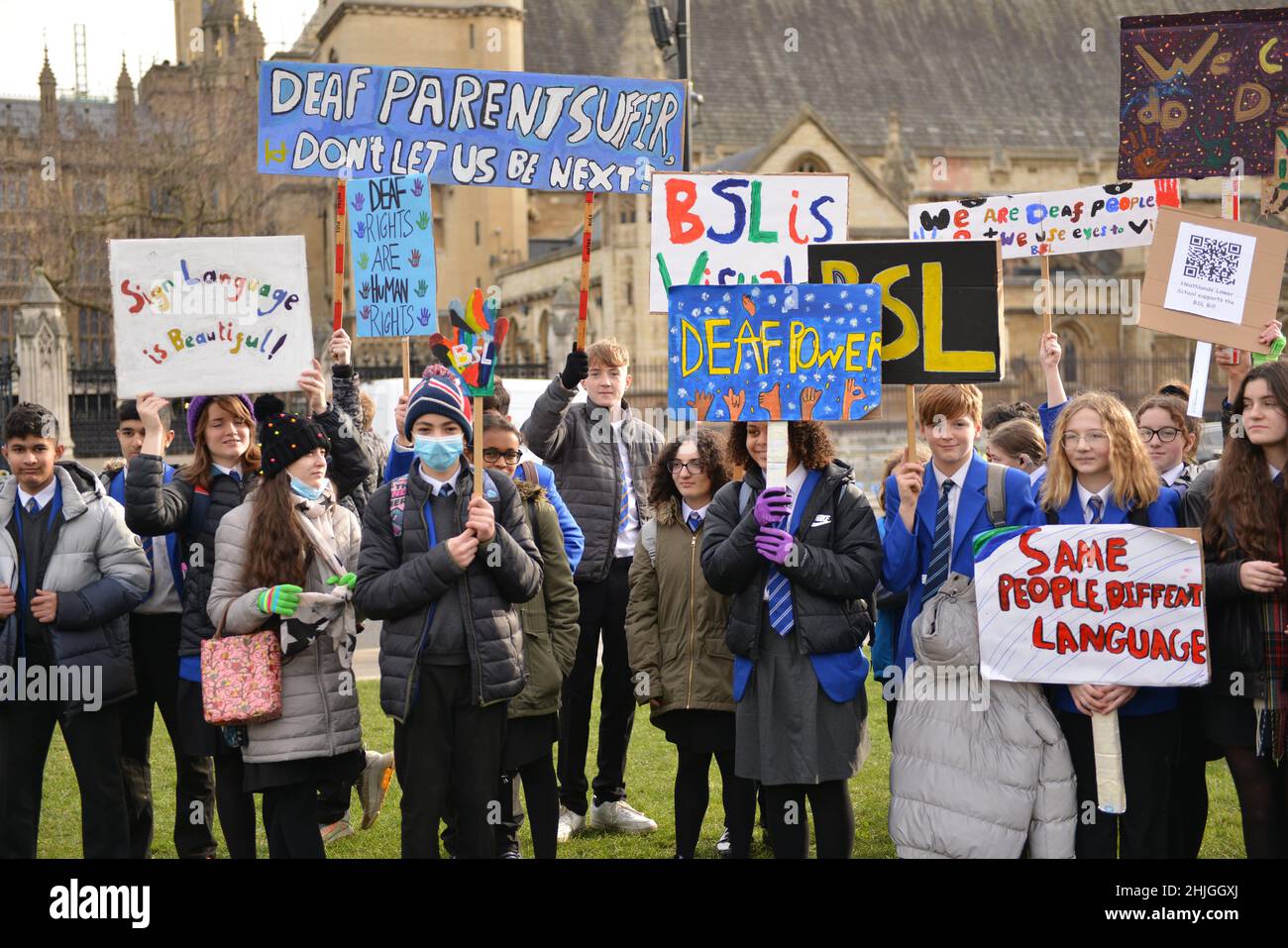 Protesters seen holding placards expressing their opinion during the demonstration. British sign language and deaf community rallied opposite the U.K. Parliament in support of BSL (British Sign Language) bill which recognises sign language as an official language of the United Kingdom. Stock Photo