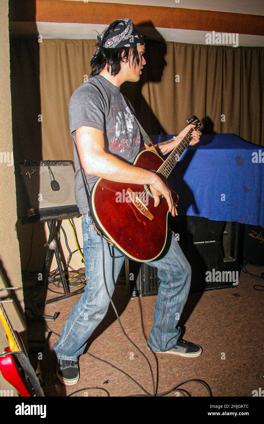 L.A. Guns, during a private gathering and concert at Palominos restaurant on October 20, 2006 in Hermosillo Sonora. L.A. Guns is an American glam metal band from Los Angeles, California. Tracii Guns is its main member and is close to Alx Rose and Guns N' Roses when they formed the band Hollywood Rose. Other members are Phil Lewis, Ace Von Johnson, Johnny Martin, Scot Coogan and Adam (photo by Luis Gutierrez/Norte Photo)  L.A. Guns, durante un convivio y concierto privado en restaurante Palominos el 20 octubre 2006 en Hermosillo Sonora.  L.A. Guns es una banda Americana  de glam  metal de  Los Stock Photo