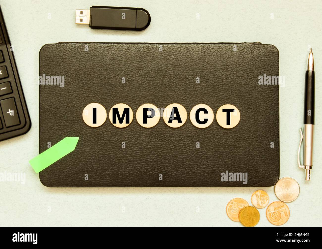 impact word written on wood block. impact text on table, concept Stock Photo