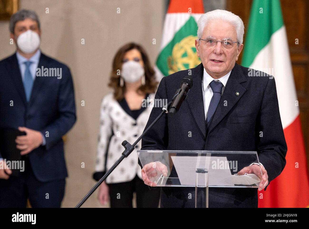 Rome, Italy. 29th Jan, 2022. Italian President Sergio Mattarella (Front) makes a declaration after receiving the official notice of his re-election at the Quirinale presidential palace in Rome, Italy, on Jan. 29, 2022. Italian President Sergio Mattarella was elected to a second term, Lower House Speaker Roberto Fico announced late Saturday, after the parliament gathered in a joint session and concluded its eighth round of voting. Credit: Str/Xinhua/Alamy Live News Stock Photo