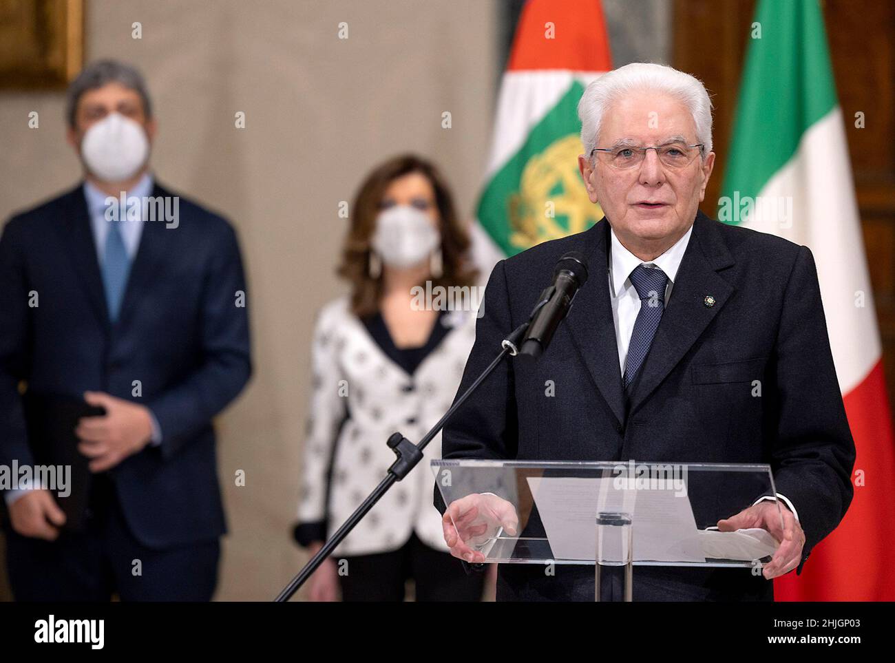 Rome, Italy. 29th Jan, 2022. Italian President Sergio Mattarella (Front) makes a declaration after receiving the official notice of his re-election at the Quirinale presidential palace in Rome, Italy, on Jan. 29, 2022. Italian President Sergio Mattarella was elected to a second term, Lower House Speaker Roberto Fico announced late Saturday, after the parliament gathered in a joint session and concluded its eighth round of voting. Credit: Str/Xinhua/Alamy Live News Stock Photo