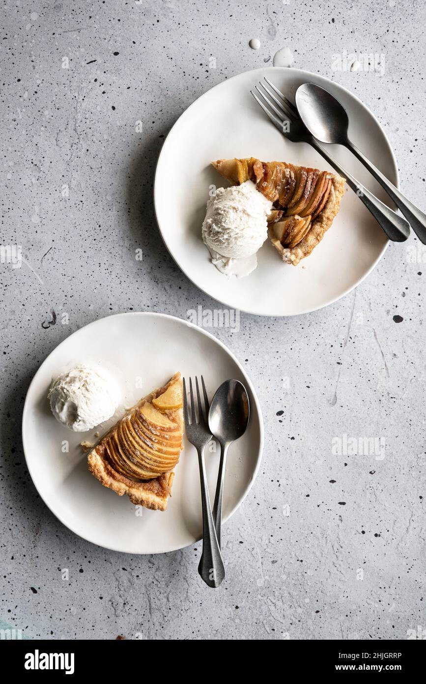 Two slices of apple tart with ice cream Stock Photo