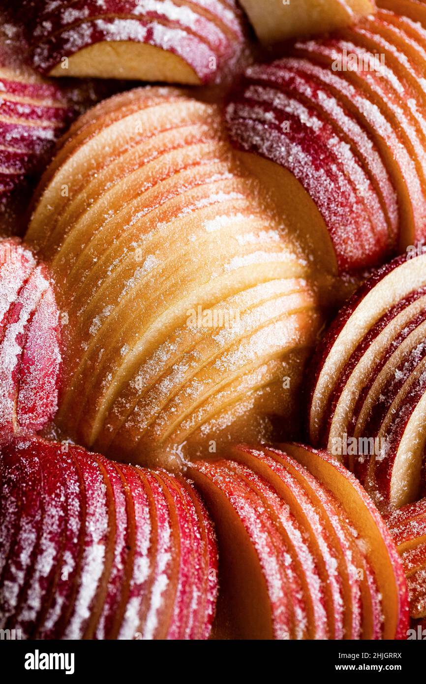A close up view of apple slices coated in sugar Stock Photo