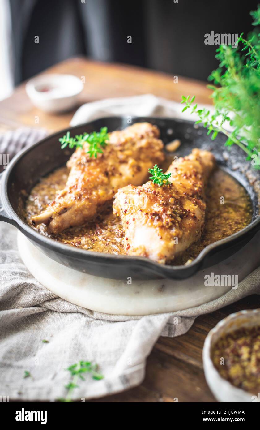 Skillet Rabbit Rabbit with mustard, cooked in a skillet pan Stock Photo - Alamy