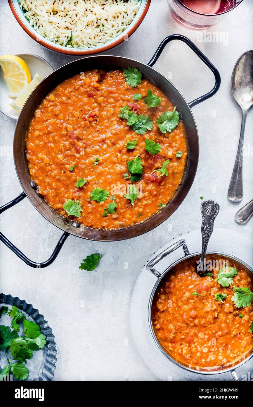 Vegan Red Lentil Dal served with cumin rice Stock Photo Alamy