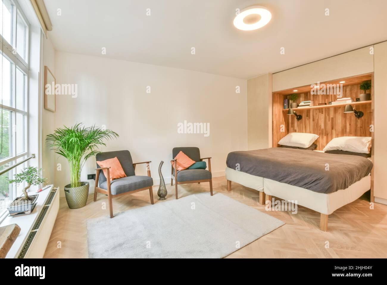 Interior of a cozy and bright bedroom with beautiful decoration Stock ...