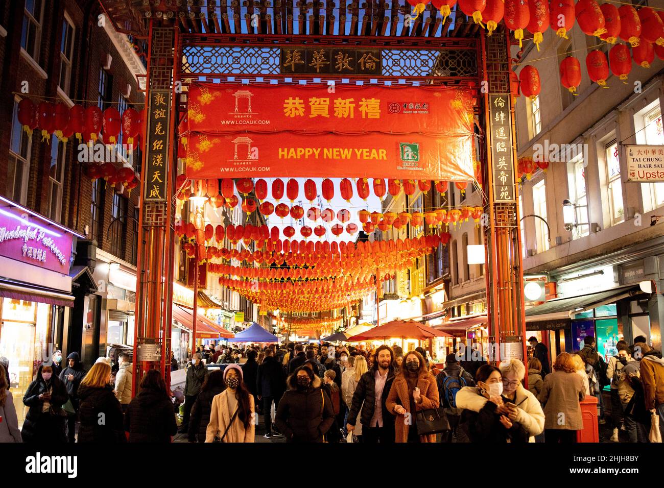 London, UK. 29th Jan, 2022. Crowds of people seen shopping in Chinatown decorated with lanterns in preparation of the Chinese New Year.Streets in Chinatown have been decorated with lanterns in preparation of the Chinese New Year. The beginning of the year of the Tiger will be celebrated on the 1st February. Credit: SOPA Images Limited/Alamy Live News Stock Photo