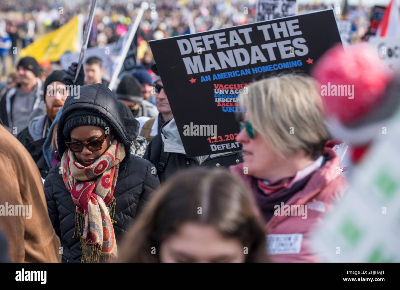 Defeat the Mandates march at Washington Monument. Demonstrators protesting mask & Covid-19 vaccination mandates.Washington, DC,Jan 23,2022 Stock Photo