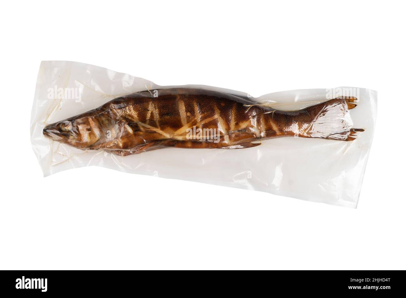 Vacuum packaged smoked fish isolated on white background Stock Photo