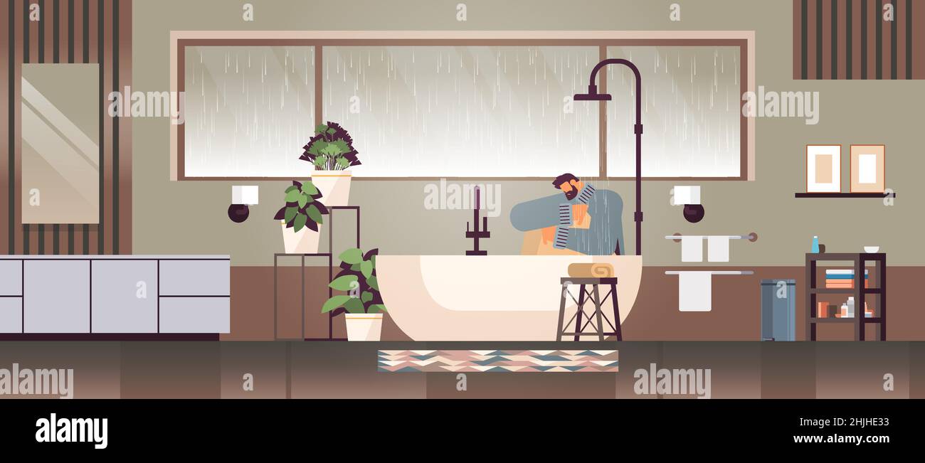 unhappy depressed man sitting in shower guy feeling desperate and