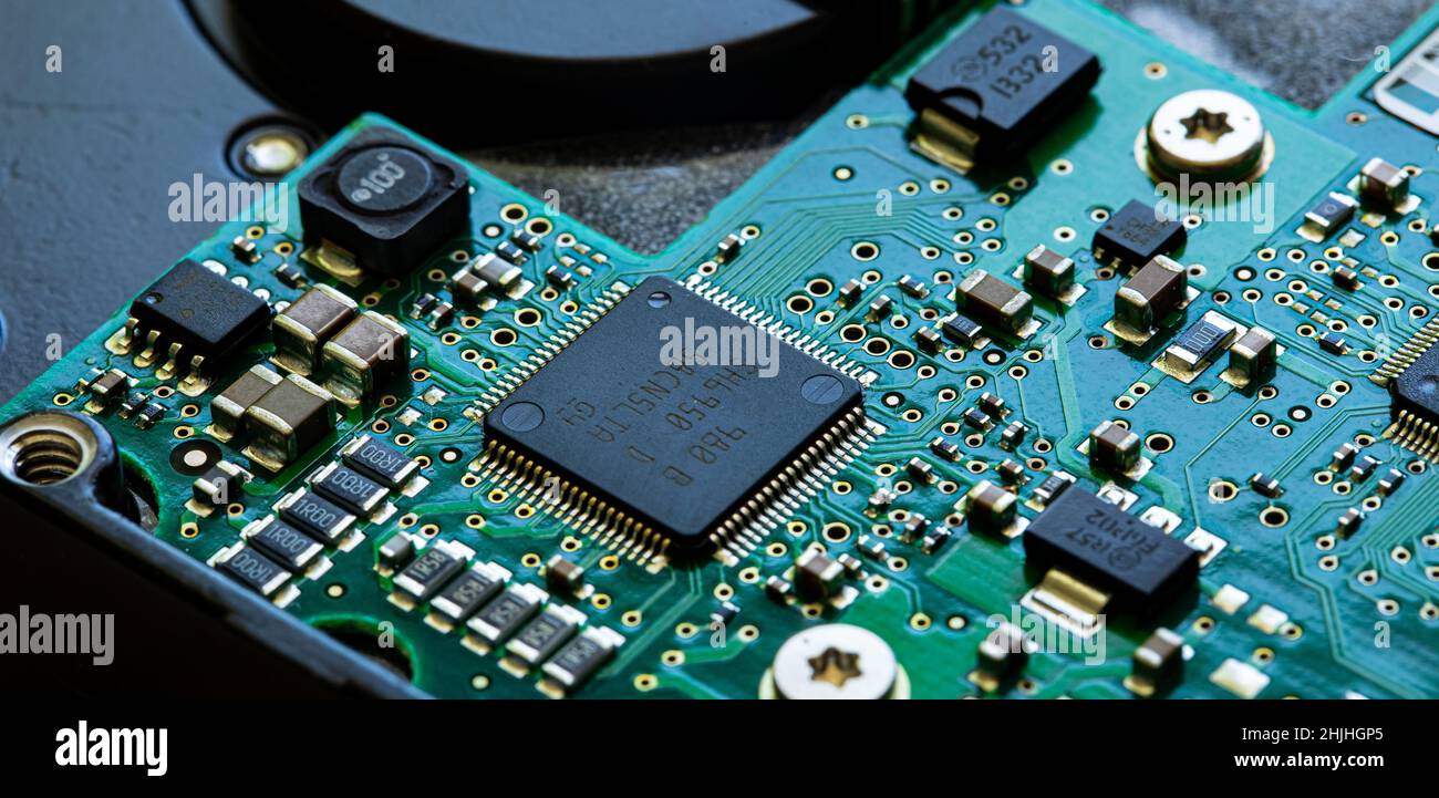 Pcb Disc Component Macro Close up of components and microchips on PC circuit board of Hard ...