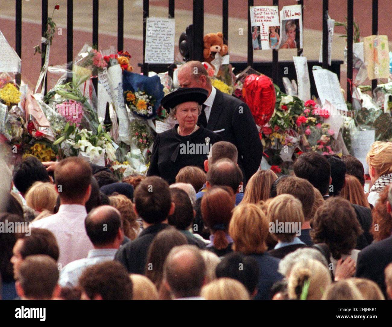 File photo dated 05/09/97 of The Queen and the Duke of Edinburgh overwhelmed by the amount of well-wishers and floral tributes at Buckingham Palace, on the eve of the funeral of Diana, Princess of Wales. Issue date: Sunday January 30, 2022. Stock Photo