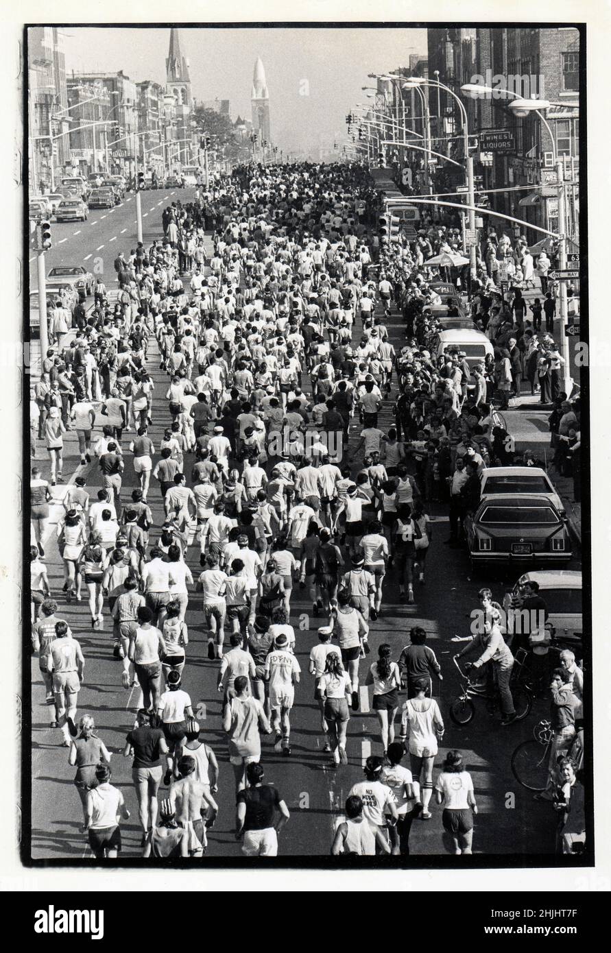 An unusual view of runners on 4th Avenue in Bay Ridge, Brooklyn as seen from above on the Gowanus expressway. From the 1981 NYC Marathon Stock Photo