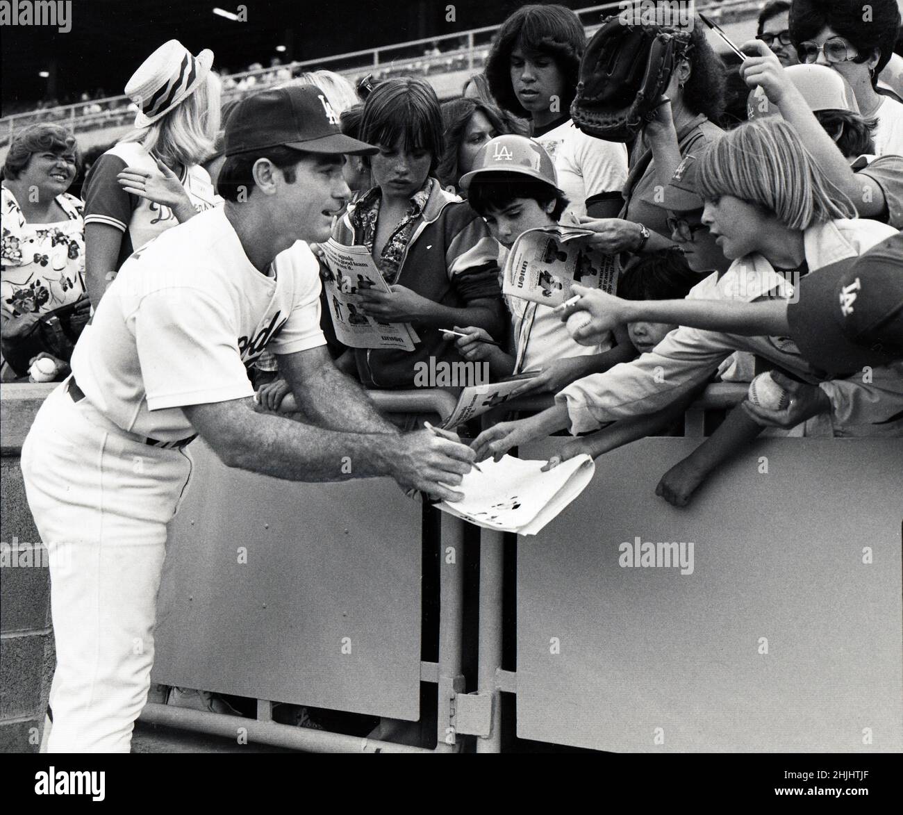 Los Angeles Dodger star Steve Garvey signs autographs for kids prior to a baseball game at Dodger Stadium in Chavez Ravine, California.. Stock Photo