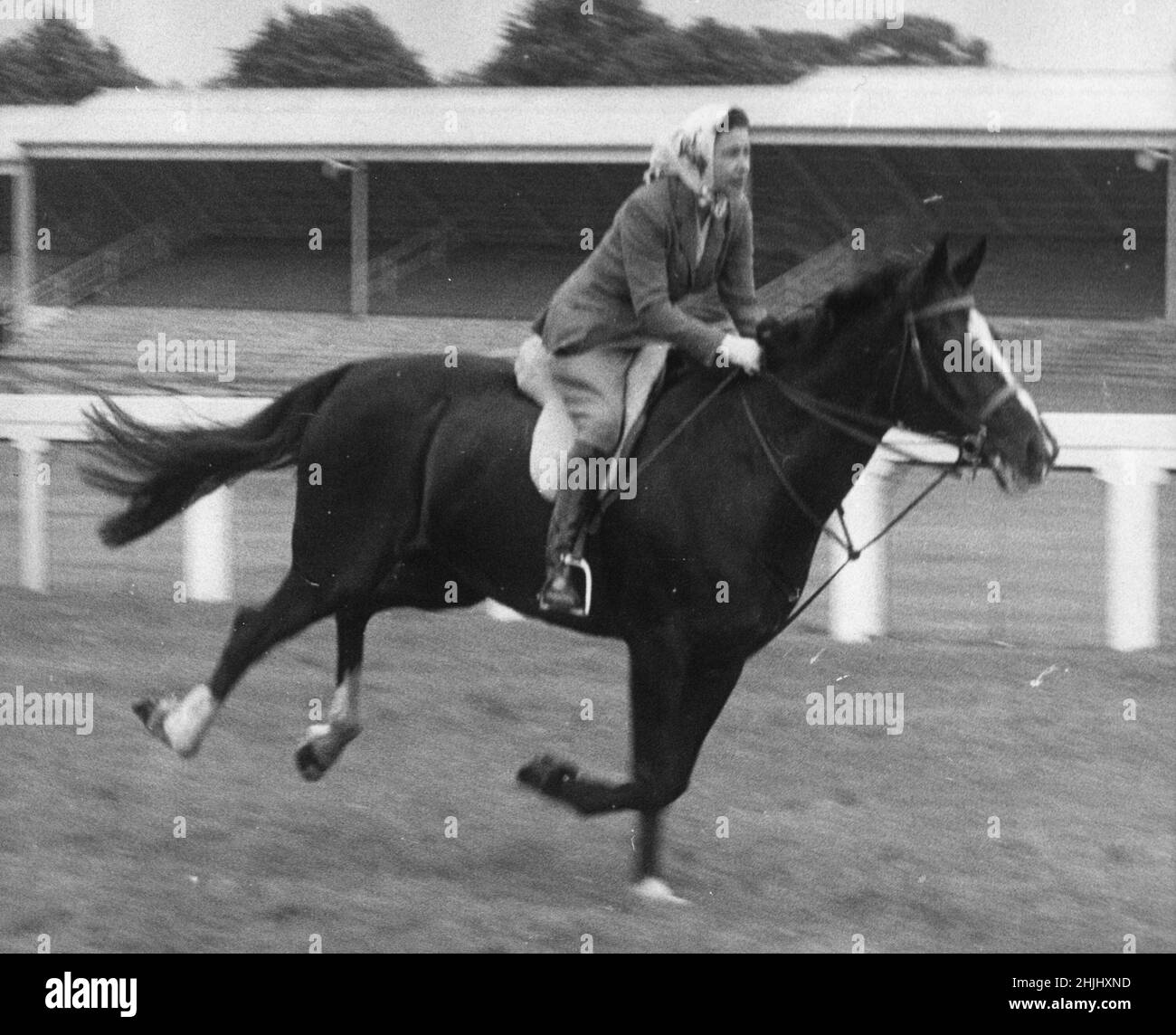 File photo dated 16/6/1960 of Queen Elizabeth II riding on the racecourse before the opening of the third day of the Royal Ascot meeting, when she took part in an unofficial 'race' and finished fourth to other members of her party of seven. More than any other interest, horses and ponies have been the Queen's passion throughout her long life. Issue date: Sunday January 30, 2022. Stock Photo