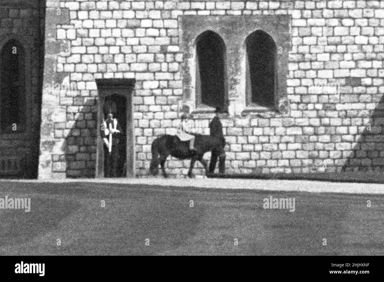 File photo from the 1930s of Princess Elizabeth riding a horse in the grounds of Windsor Castle. More than any other interest, horses and ponies have been the Queen's passion throughout her long life. Issue date: Sunday January 30, 2022. Stock Photo