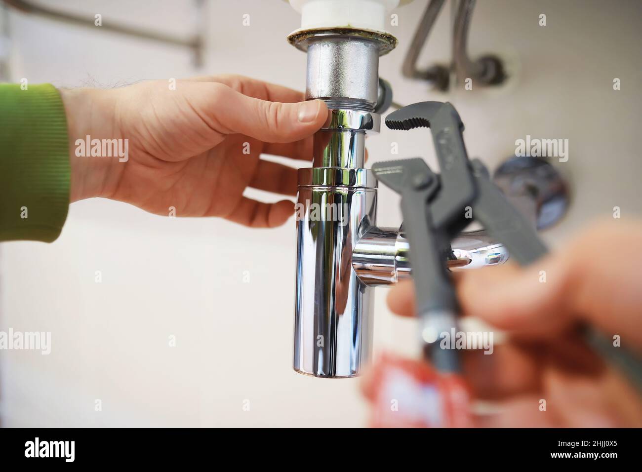 Plumbing repair. Sewer cleaning. Food grinder inspection repair Stock