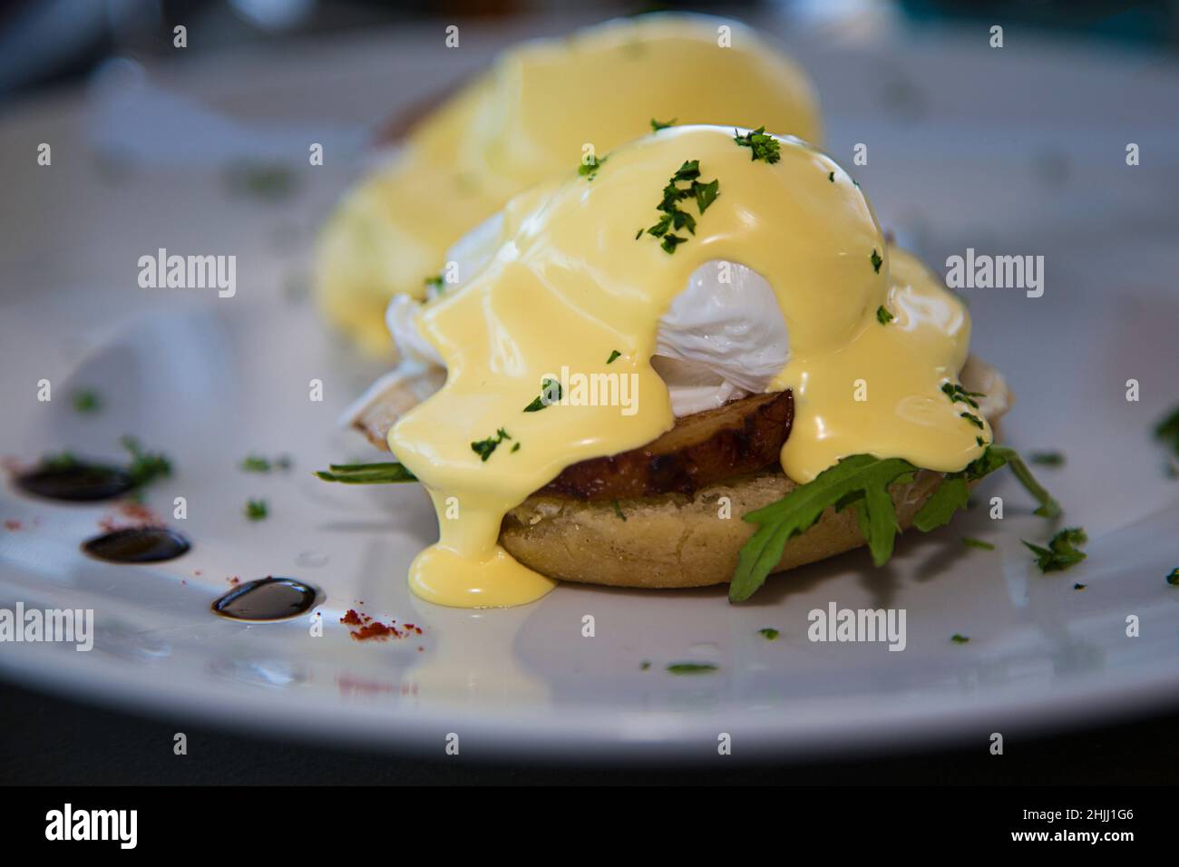 Eggs Benedict served in a restaurant Stock Photo