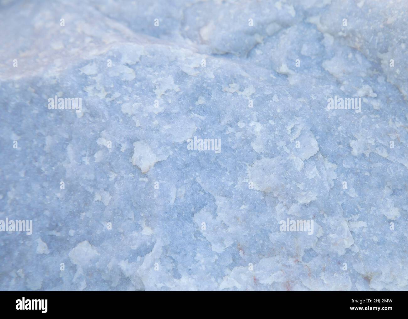 Snow white natural quartz, uncut and raw Stock Photo