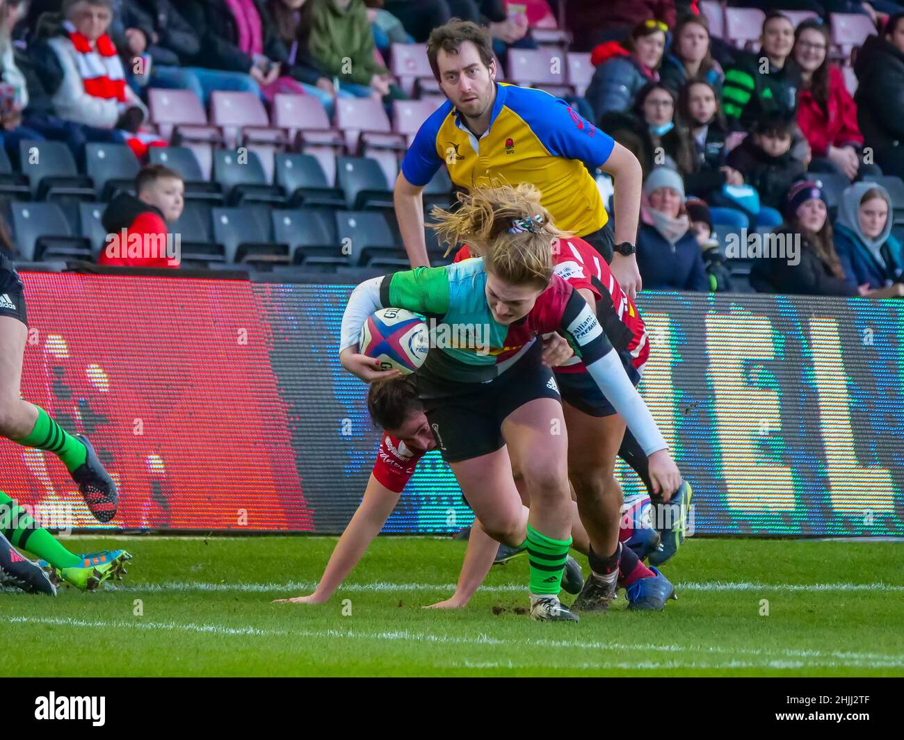 London, UK. 29th Jan, 2022. Twickenham Stoop, London, England, January 29th 2022 Freya Aucken (15 - Harlequins Women) slips out of the tackle in the match between Harlequins Women and Gloucester-Hartpury Women in Round 12 of the Allianz Premier 15s at the Twickenham Stoop on Saturday 29th January 2022 Claire Jeffrey/SPP Credit: SPP Sport Press Photo. /Alamy Live News Stock Photo