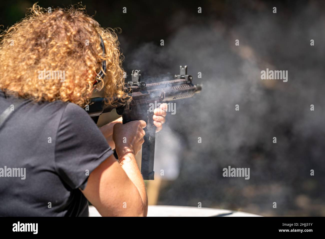 shooting from a machine gun at the shooting range Stock Photo Alamy