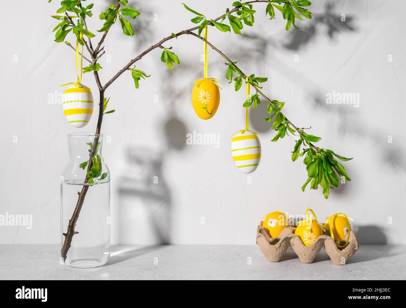 Seasonal decoration with Easter tree and colored eggs Stock Photo