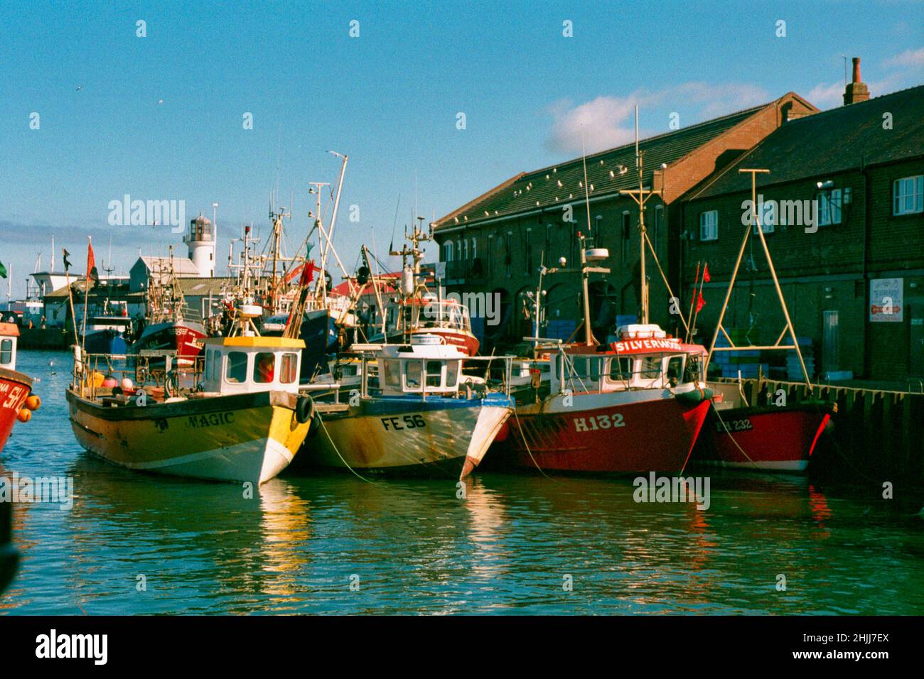 Fishing boats in Scarborough harbour August summer day 1983 Stock Photo