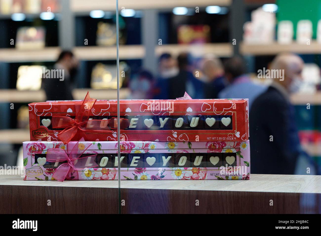 30 January 2022, North Rhine-Westphalia, Cologne: Chocolate bars with the inscription 'I love you' are seen on a stand on the first day of ISM - International Sweets and Biscuits Fair. The international trade fair of the confectionery industry continues until 2.2.2022. Photo: Henning Kaiser/dpa Stock Photo