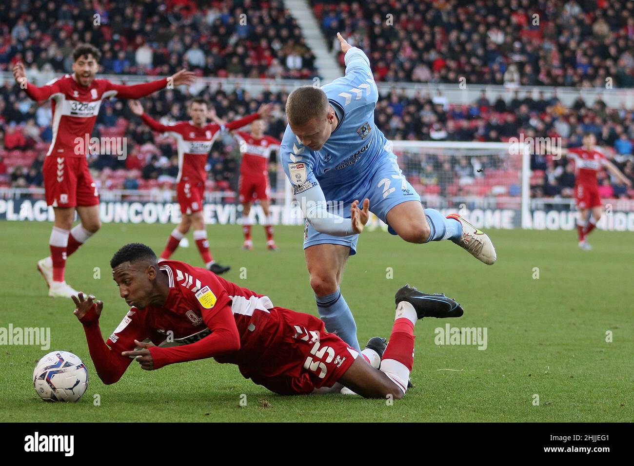 Jake Bidwell of Coventry City brings down Isaiah Jones of Middlesbrough - Middlesbrough v Coventry City, Sky Bet Championship, Riverside Stadium, Middlesbrough, UK - 29th January 2022  Editorial Use Only - DataCo restrictions apply Stock Photo
