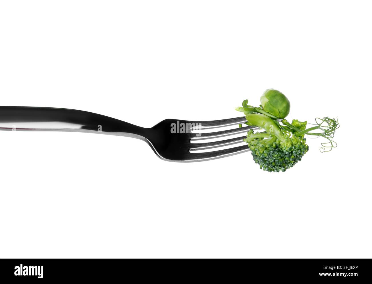 Fork with fresh vegetables on white background Stock Photo