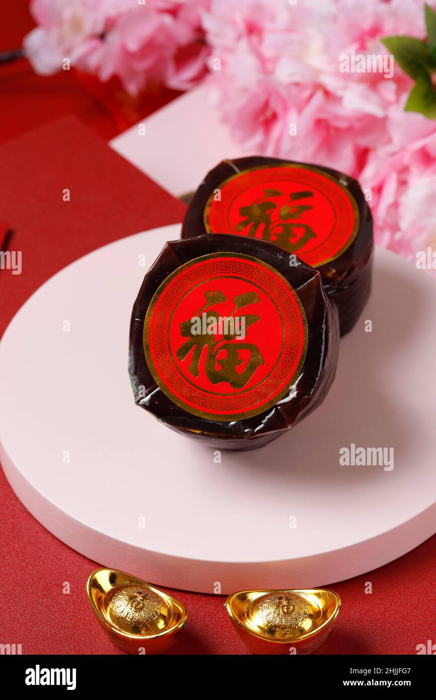 Nian Gao or Kue Bakul, Prepared Food from Glutinous Rice Flour, Eat at Chinese New Year Festival. Known as Kue Keranjang. Chinese Character is FU Mean Stock Photo