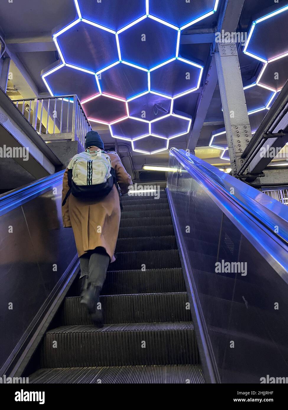 Riding up the escalator connecting the Broadway/Lafayette F train