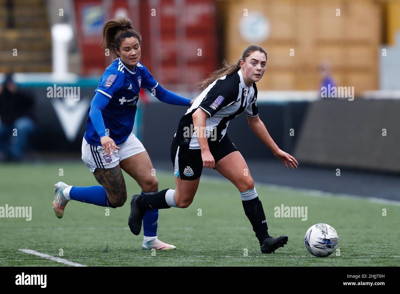 NEWCASTLE UPON TYNE, UK. JAN 30TH Jane Harland of Newcastle United and Natasha Thomas of Ipswich Town in action during the Women's FA Cup Fourth Round match between Newcastle United and Ipswich Town at Kingston Park, Newcastle on Sunday 30th January 2022. (Credit: Will Matthews | MI News) Credit: MI News & Sport /Alamy Live News Stock Photo