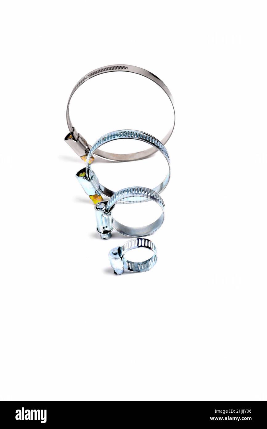 hose clip, round worm tightening clamps on white background, closeup