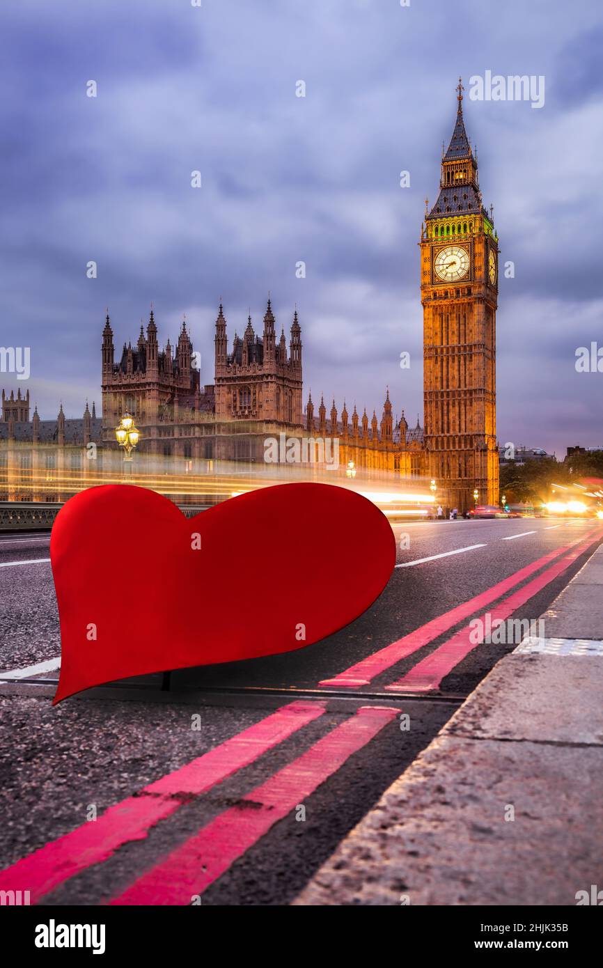 Big Ben against giant heart during Happy Valentine's Day in London, UK Stock Photo