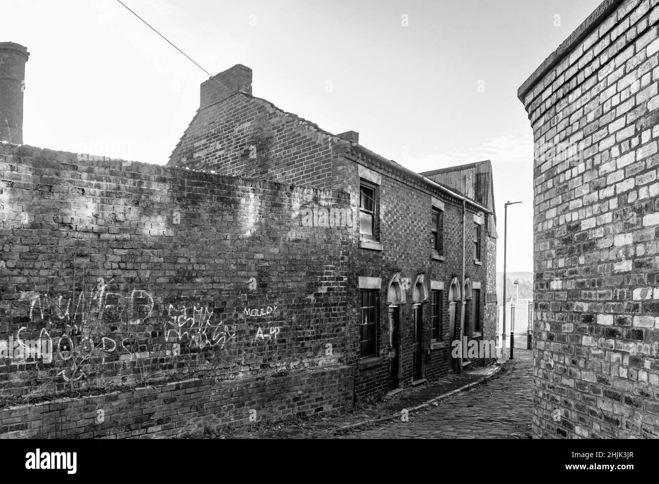 monochrome old traditional victorian terraced street Short street in