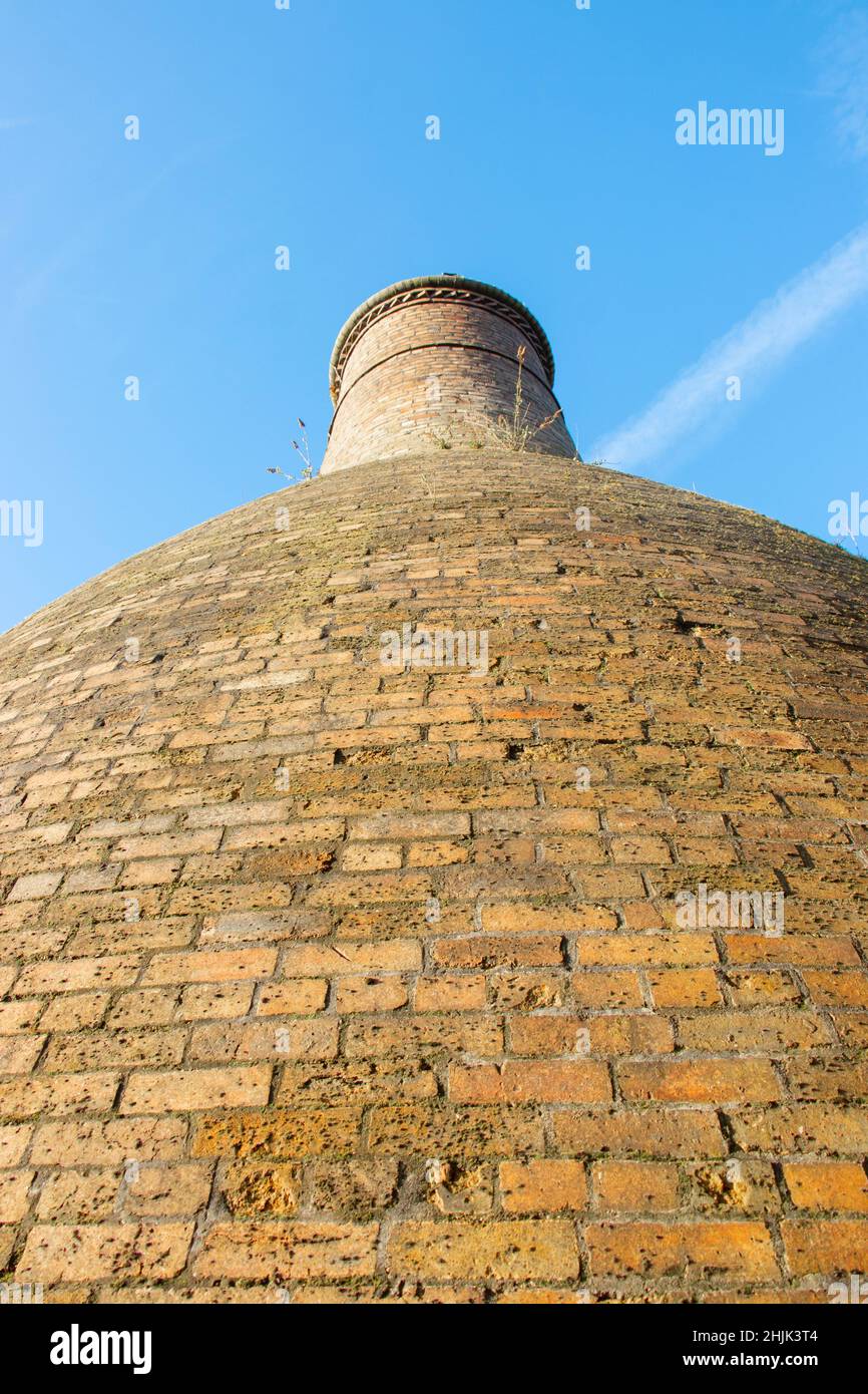 looking up traditional victorian ceramic pottery factory with bottle