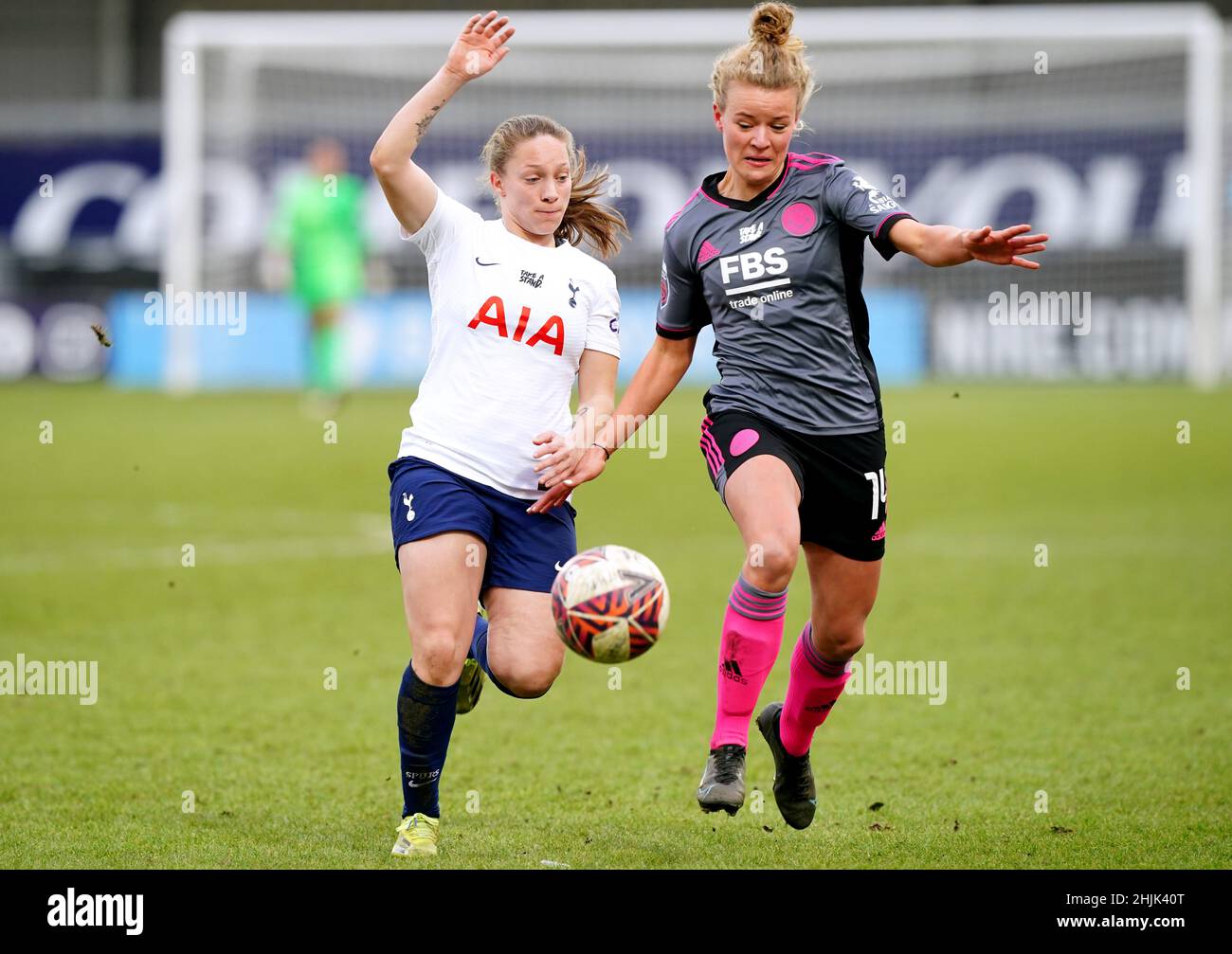 Tottenham Hotspur's Angela Addison (left) and Leicester City's Esmee de Graaf battle for the ball during the Vitality Women's FA Cup fourth round match at The Hive, London. Picture date: Sunday January 30, 2022. Stock Photo