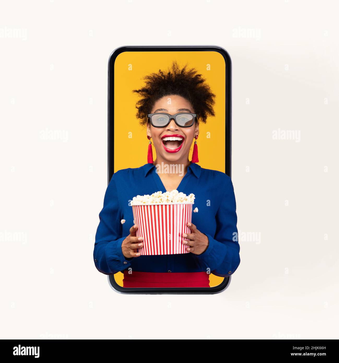 Woman In Smartphone Wearing 3D-Glasses Holding Popcorn Watching Movie, Studio Stock Photo