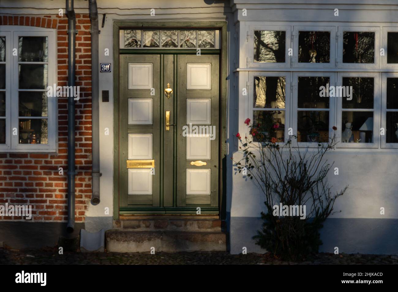 Travel Denmark: Light and shadow on a cozy house facade in Møgeltønder Stock Photo