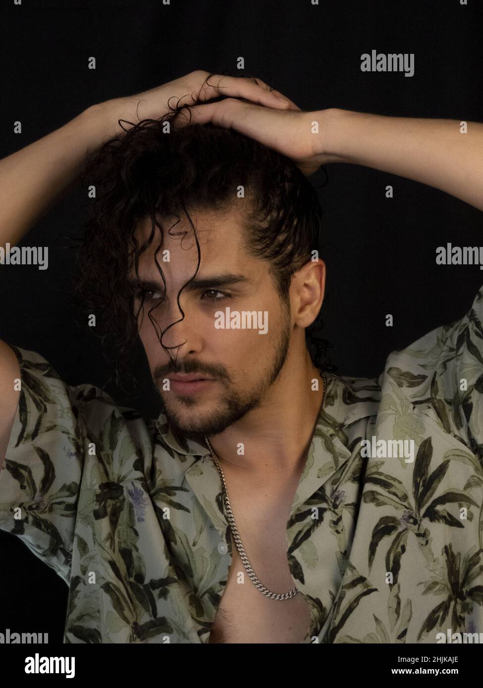 Hispanic handsome man posing for the camera Stock Photo