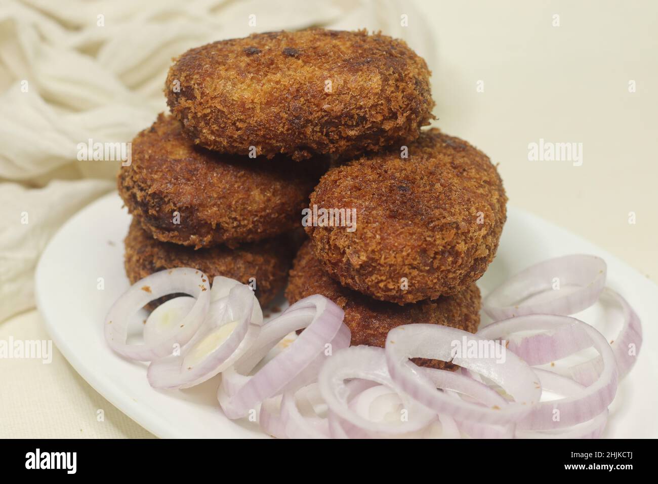 Deep fried Chicken Cutlets. A flat croquette of minced meat covered in