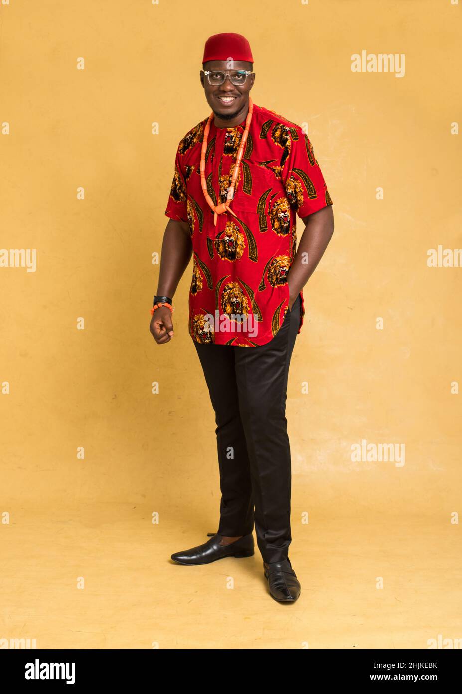 Igbo Traditionally Dressed Business Man Standing Posturing Stock Photo