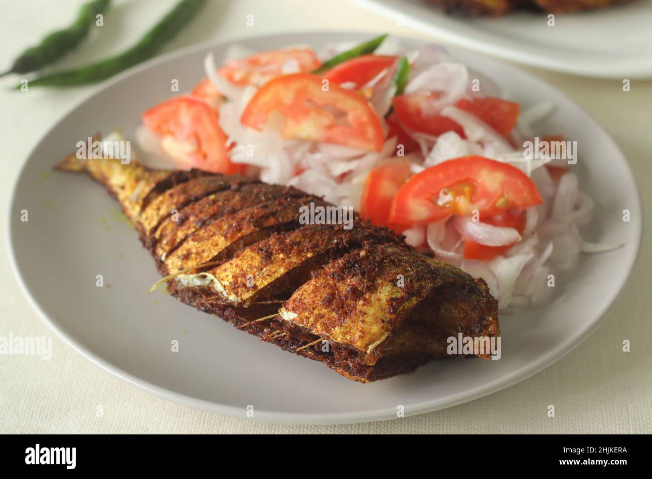 Ayala Meen fry or Mackerel fish fry. Spicy fish fry prepared in South Indian style. Mackerel fish marinated in an oil marinade and shallow fried in oi Stock Photo