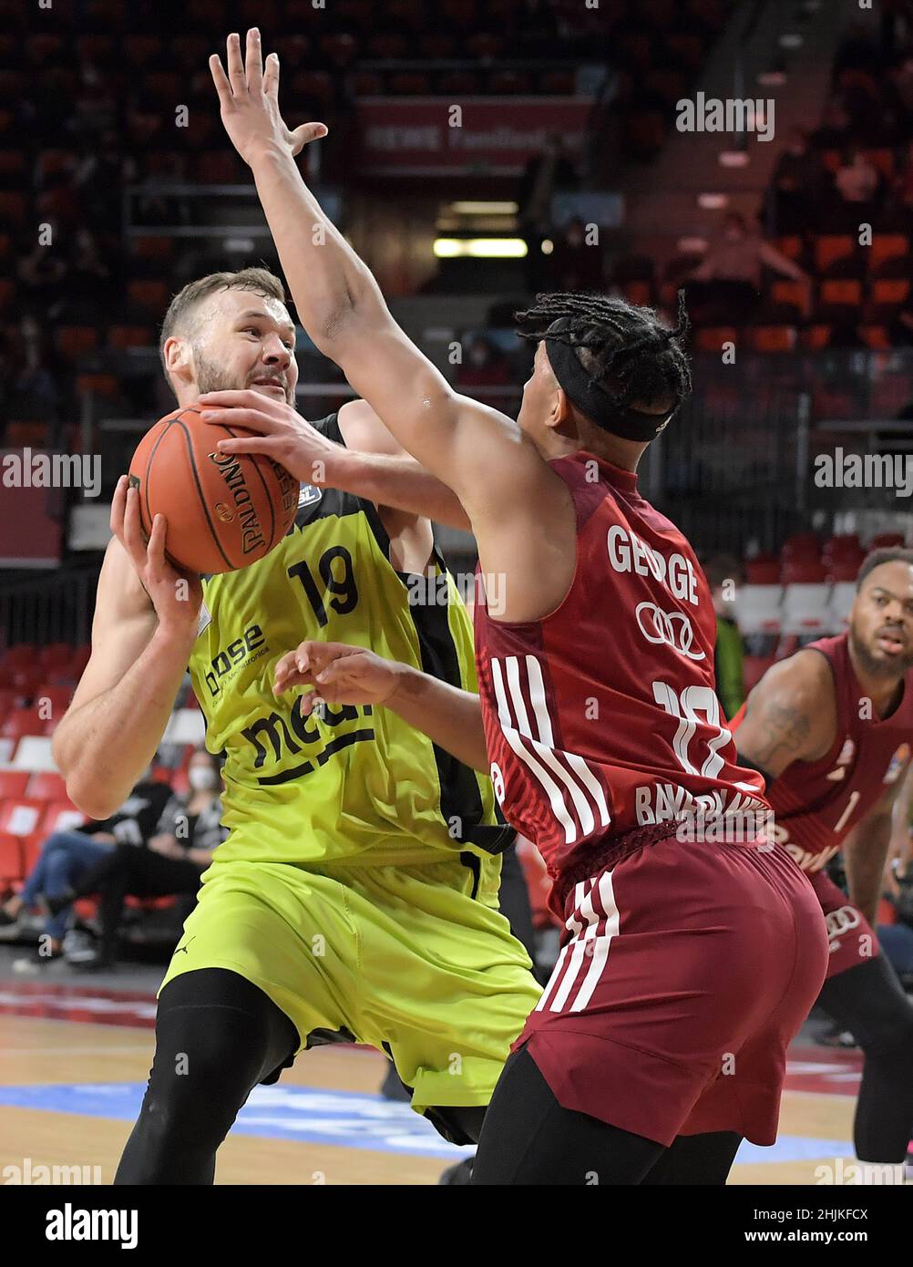 Muenchen, Deutschland (DE), 30 January, 2022. Pictured left to right, Martynas Sajus (medi Bayreuth), Jason George (FC Bayern Basketball) Zweikampf, Aktion, action, battle for the ball at the Basketball BBL Bundesliga, FC Bayern Muenchen Basketball - medi Bayreuth. Credit: Eduard Martin/Alamy Live News Stock Photo