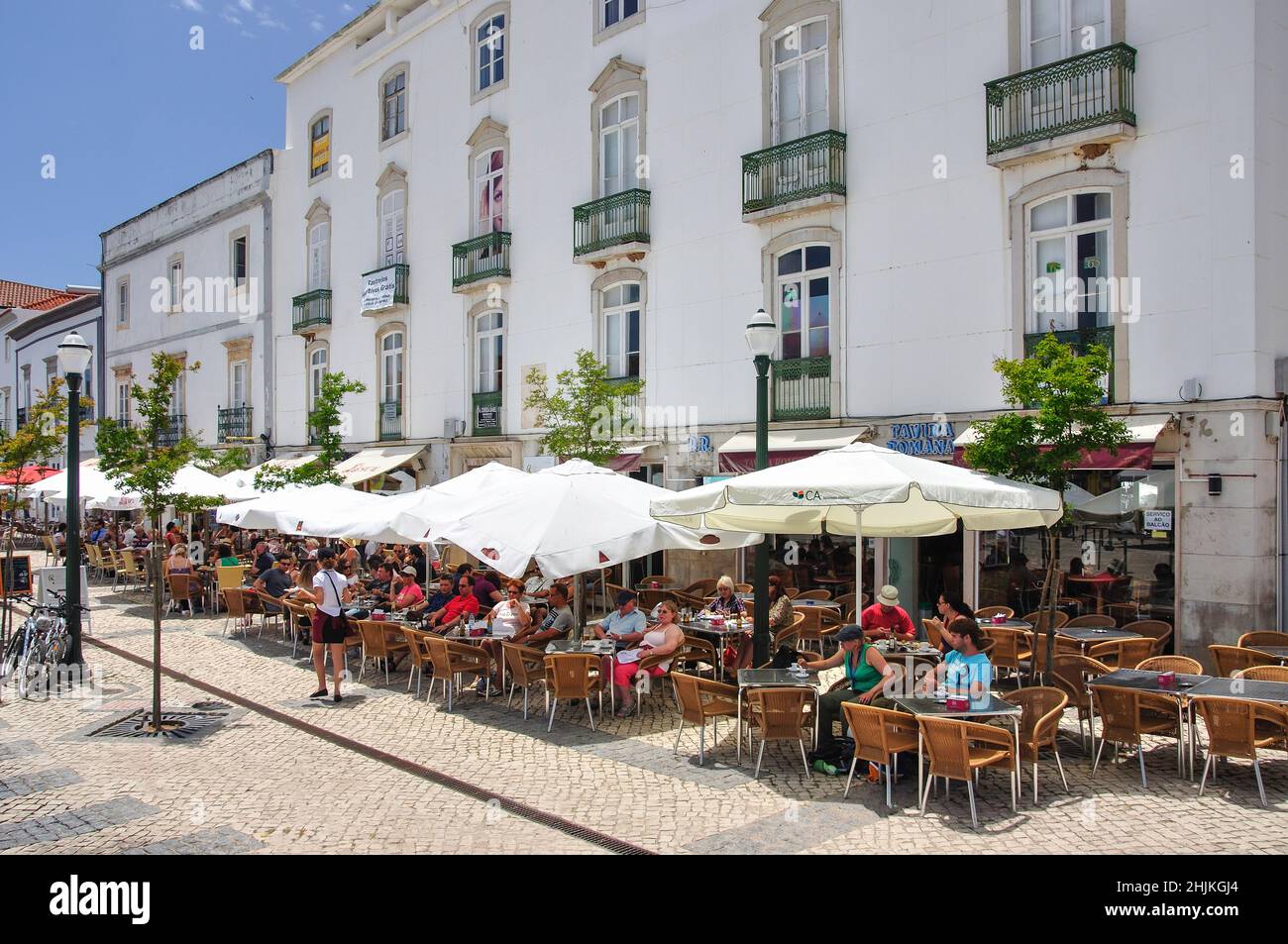 Outdoor restaurant, Praca da Republic, Tavira, Algarve Region, Portugal Stock Photo