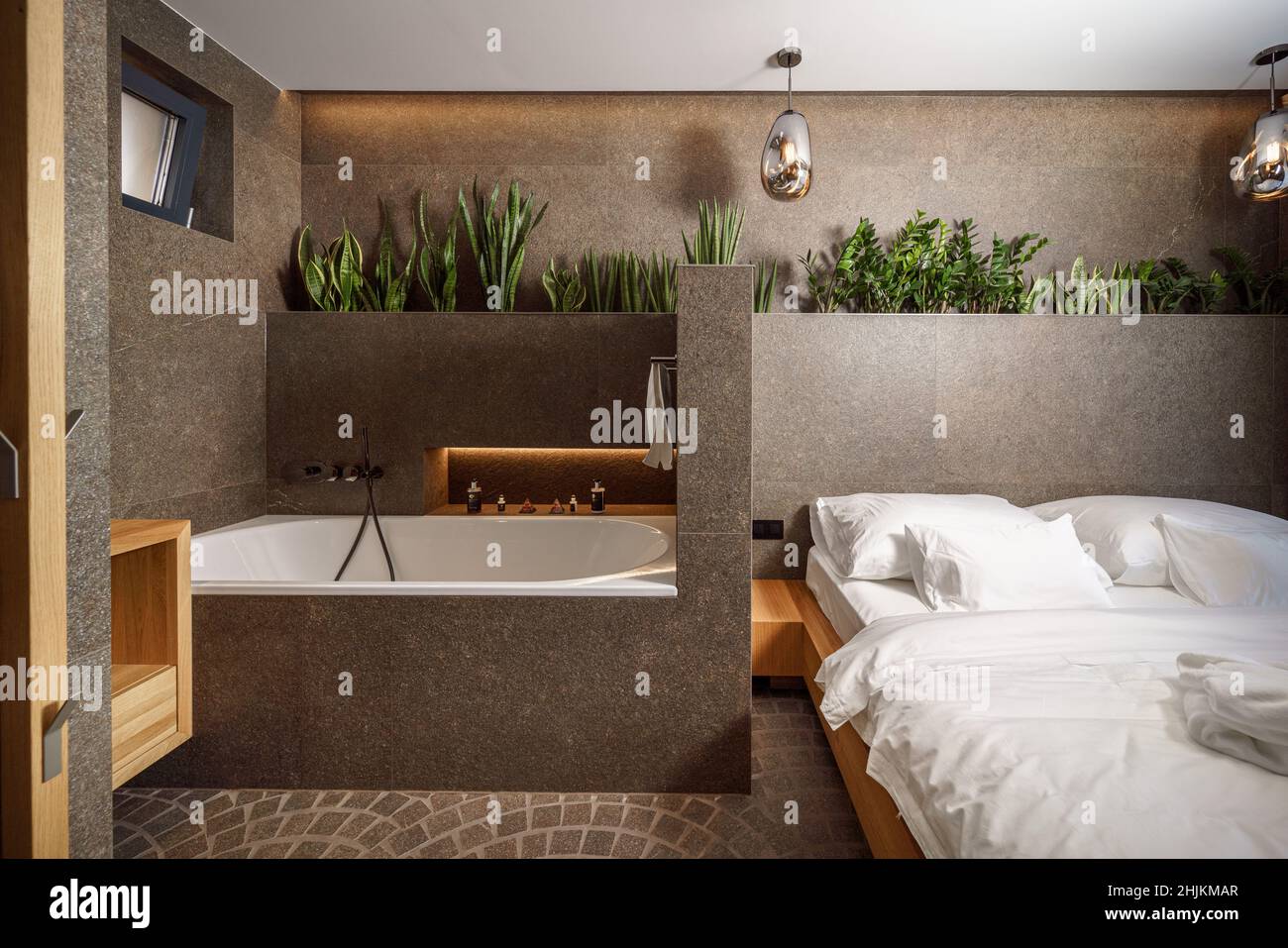 Interior of modern bedroom suite with bath in luxury hotel Stock Photo ...