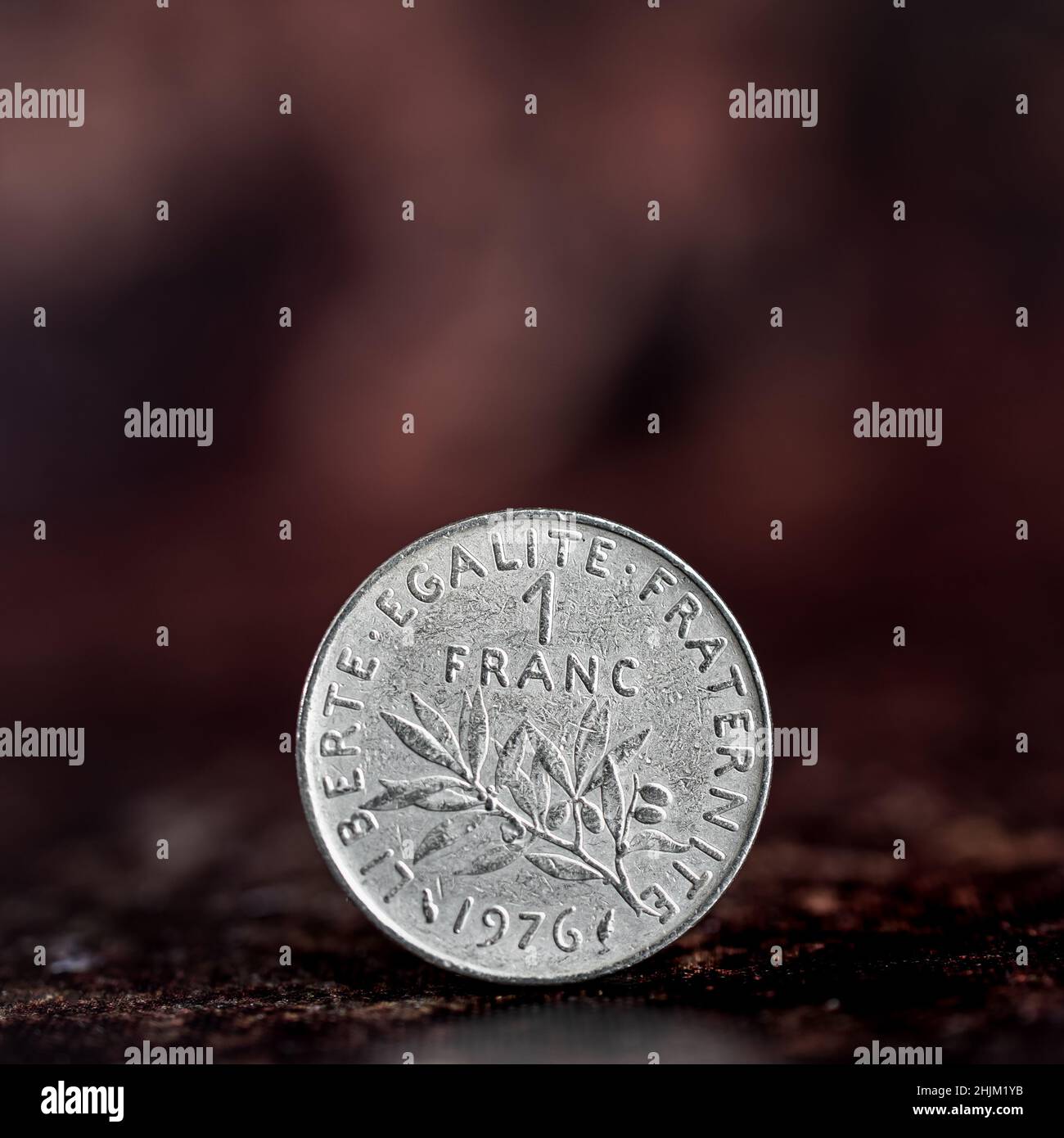 Isolated One Franc Coin On A Dark Ancient French Square