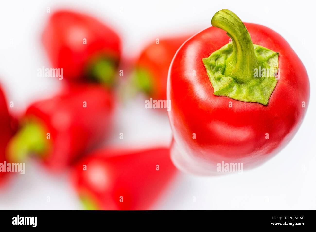 Close-up of red bell peppers. Fresh red sweet pepper. Stock Photo