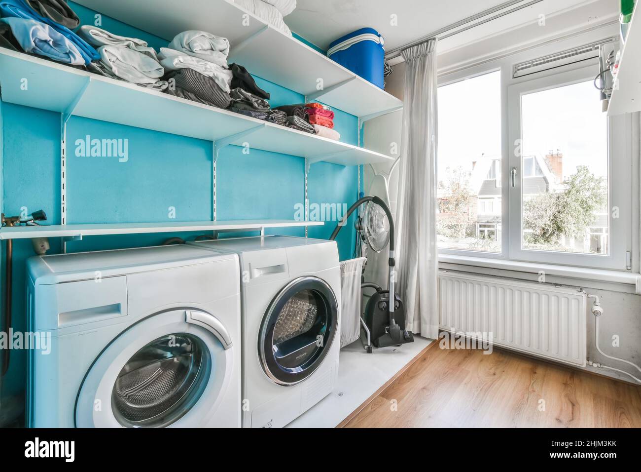 Interior of small clean laundry room in modern hause Stock Photo Alamy